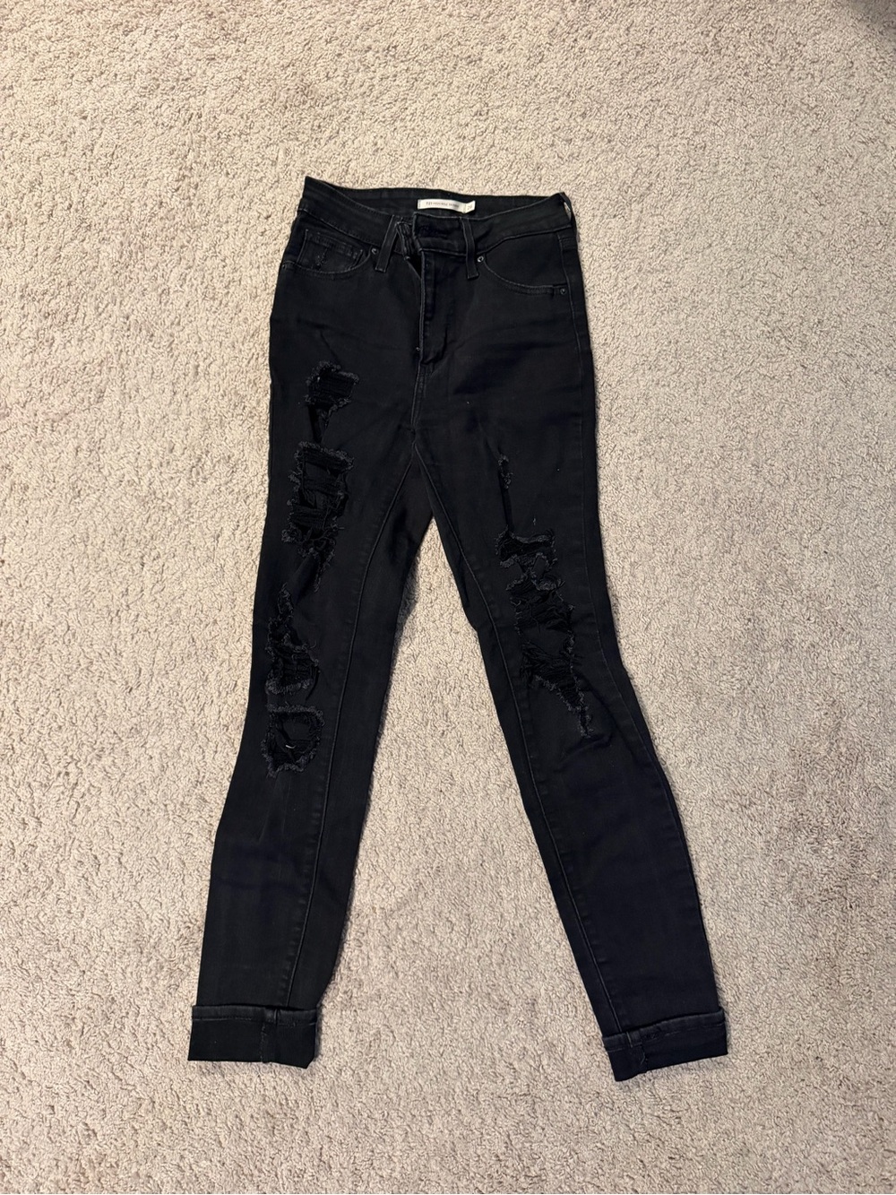 Levi's High-Rise Black Distressed Skinny Jeans